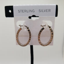 Load image into Gallery viewer, Sterling silver 925 earrings Oval hoops with diamond cuts
