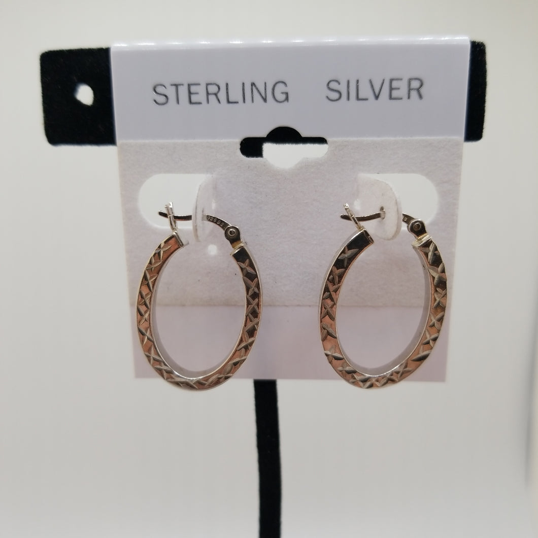 Sterling silver 925 earrings Oval hoops with diamond cuts