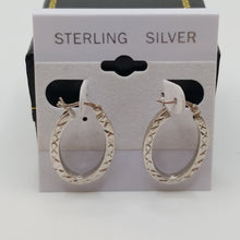 Load image into Gallery viewer, Sterling silver 925 earrings Oval hoops with diamond cuts
